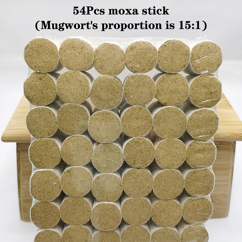 A person is using a moxa stick to perform a facial massage on their own eye area.