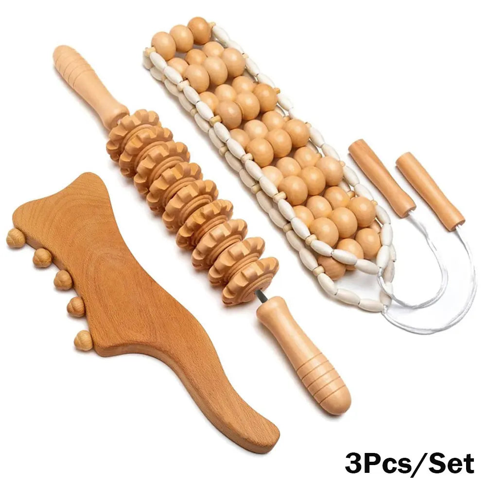 A set of wooden massage tools including a roller massager, a gua sha massager, and a cupping set, displayed on a white background.