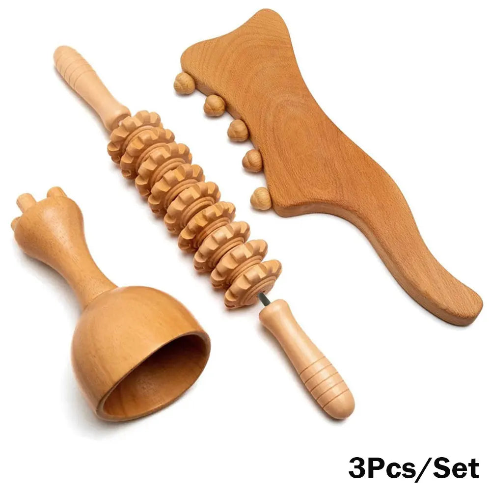 A set of wooden massage tools including a roller massager, a gua sha massager, and a cupping set, displayed on a white background.