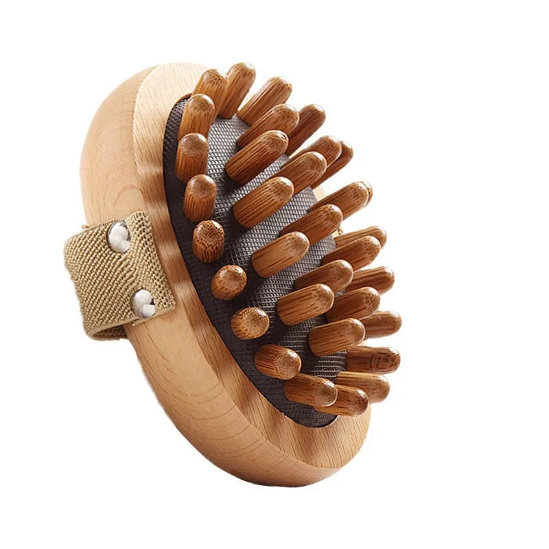 A person using a wooden anti-cellulite massage brush on their abdomen, showing the brush's ergonomic design and bristle pattern.