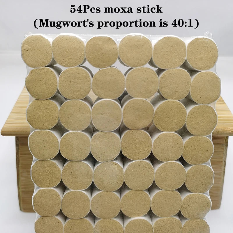 A person is using a moxa stick to perform a facial massage on their own eye area.