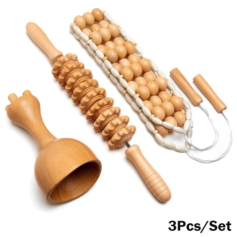 A set of wooden massage tools including a roller massager, a gua sha massager, and a cupping set, displayed on a white background.