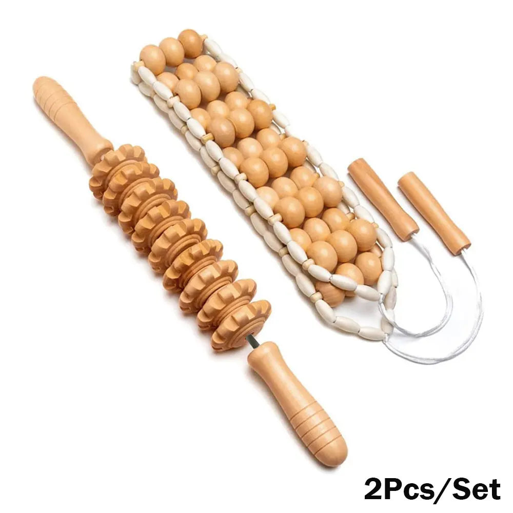 A set of wooden massage tools including a roller massager, a gua sha massager, and a cupping set, displayed on a white background.