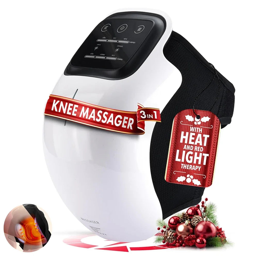 A white knee massager device with a black strap, featuring a control panel with touch buttons, and labels indicating 'KNEE MASSAGER' along with 'HEAT' and 'LIGHT THERAPY'. The product is displayed with Christmas-themed decorations in the background.
